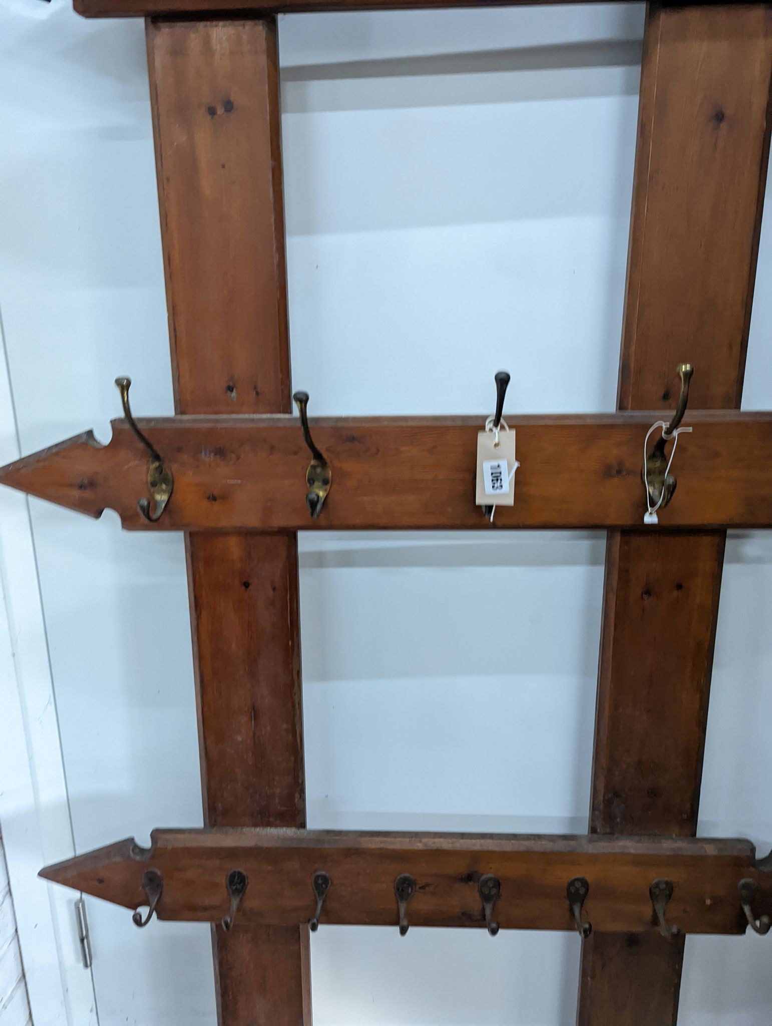 A late Victorian pitch pine hall stand, width 98cm, height 240cm